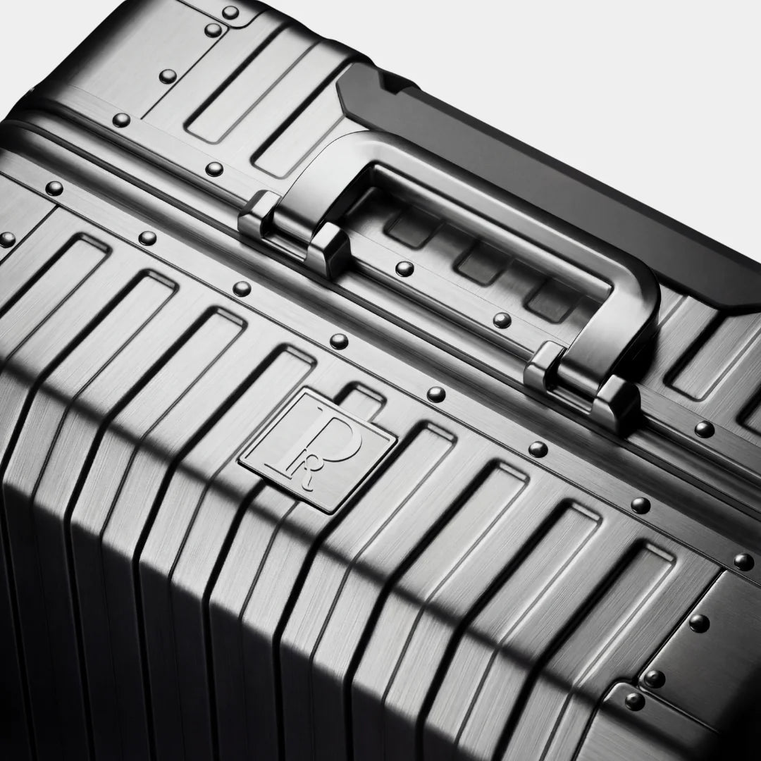 files/Prestivium_Aluminum_Suitcase_Black_Logo.webp